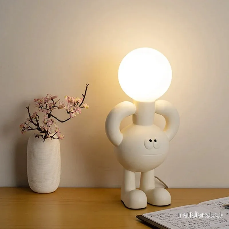 Lekfull bordslampa med glaskula – Glombra Lekfull bordslampa med glaskula – Glombra