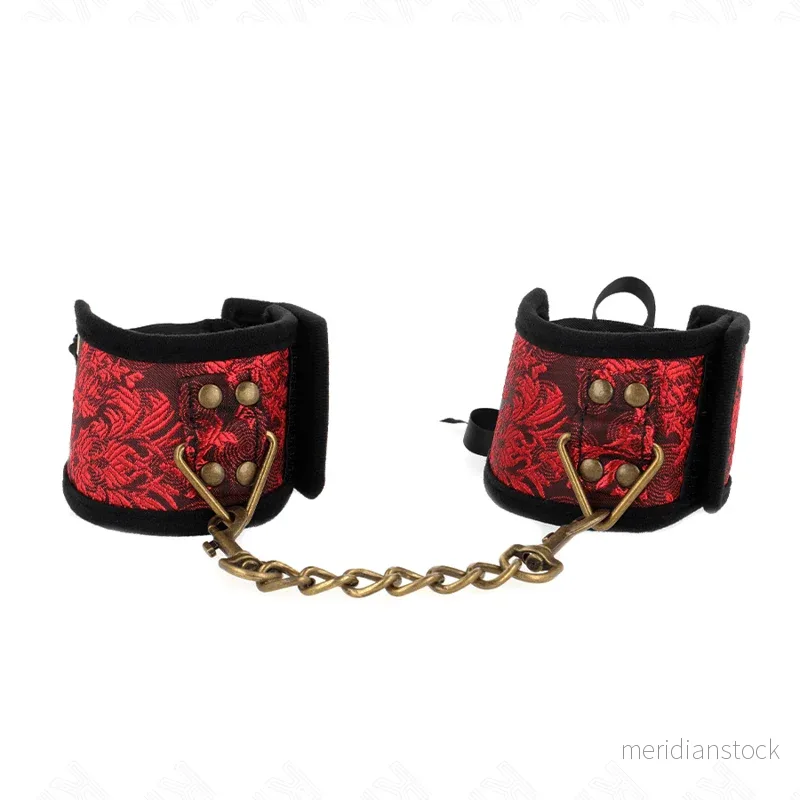 KINK - SCANDAL WRIST RESTRAINTS RED-BLACK LACE DETAILS 24.5 CM X 6.5 CM