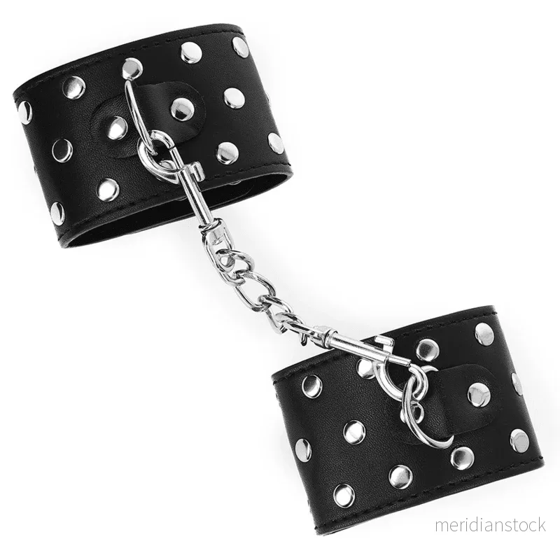 KINK - WRIST RESTRAINTS WITH SNAP FASTEN FULL OF RIVETS BLACK ADJUSTABLE 19-24 CM X 5.5 CM - Bild 2